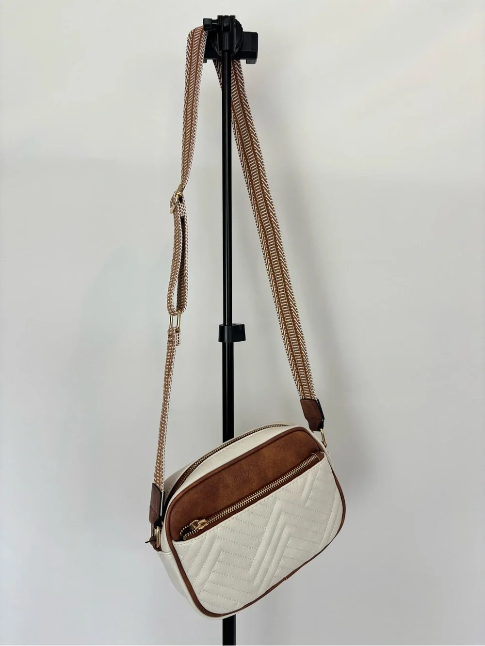 Cream Crossbody Bag with Tan Trim and Adjustable Strap